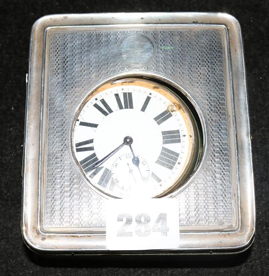 Silver travelling case and a pocket watch